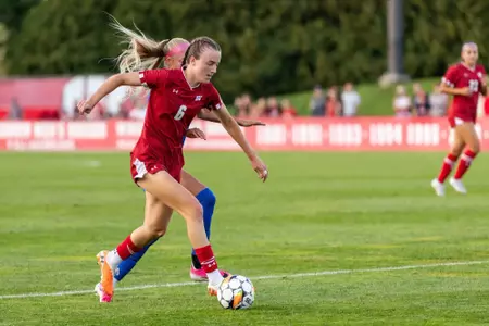 Jane Rogers sprinting with the ball down the field - Wisconsin Women's Soccer vs BYU