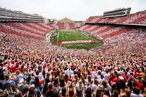 Red- and white-wearing Badger football fans created a stripe-out effect in Camp Randall Stadium at the University of Wisconsin-Madison, where the Wisconsin football team went on to defeat the Michigan Wolverines, 35-14, on the Sept. 21, 2019. (Photo by Jeff Miller / UW-Madison)