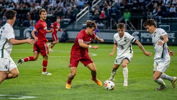 Matthew Zachemski makes a move against Michigan State