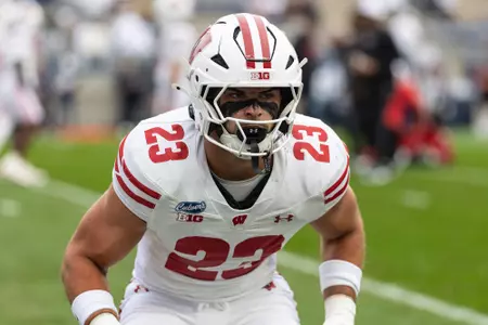 Landon Gauthier (23) warms up against Penn State