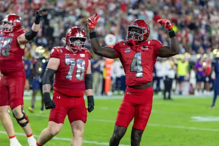 Malachi Coleman celebrates after touchdown against Notre Dame