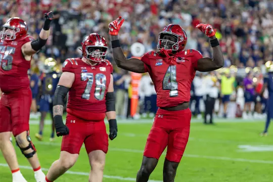 Malachi Coleman celebrates after touchdown against Notre Dame