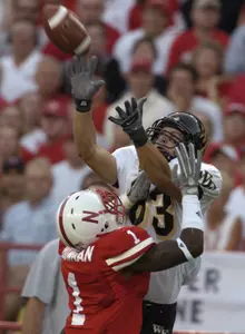Nate Morton catches a pass over Nebraska's Zackary Bowman during the first half Saturday.