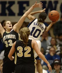 Wake Forest's Corinne Groves (33) and Dierdre Naughton (32) defend against Duke at Cameron Indoor Stadium in Durham, N.C. on Monday, Jan. 2, 2006. (AP Photo/Sara D. Davis)
