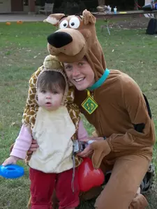 Soccer player Lindsay Jaco with her giraffe friend