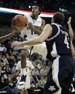 Ishmael Smith drives to the basket. (AP Photo/Chuck Burton)