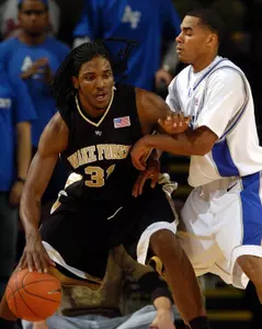Jamie Skeen drives against Air Force.