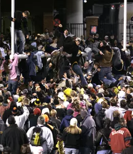 Wake Forest students celebrate their teams' 21-14 win over Boston College in a college football game in Winston-Salem, N.C., Saturday, Nov. 4, 2006. (AP Photo/Chuck Burton)