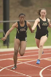 Sophomore Melissa Council (left) set a personal record and three seasonal records at the Carolina Classic meet.