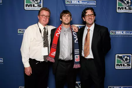 Ryan Solle and New England head coach Steve Nicol