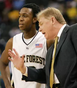 Ishmael Smith gets instruction from Skip Prosser.