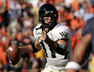 Quarterback Riley Skinner looks for a receiver during the second half.