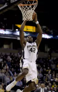 L.D. Williams, who finished with 10 points, dunks during the first half.