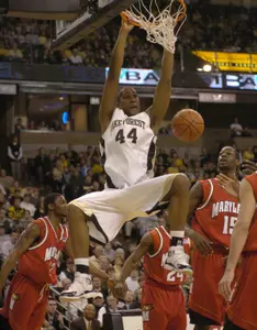 David Weaver dunks in the first half. (AP Photo/Winston-Salem Journal, Bruce Chapman)