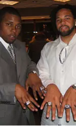 Damon McWhite and Jyles Tucker display their ACC Championship and FedEx Orange Bowl rings.