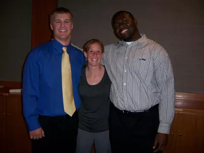 Three of the five inductees: Charlie Mellies, Lauren Crandall and Louis Frazier
