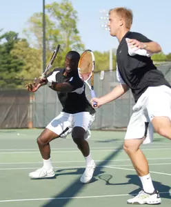 Todd Paul and Mariusz Adamski battled past Dimitar Kutrovsky and Josh Zavala of Texas on Thursday, 6-4, 6-4, in the opening round of the NCAA Doubles Championship in Athens, Ga.