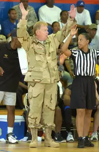 Skip Prosser coached at Operation Hardwood in Kuwait this summer.