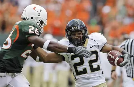 Brandon Pendergrass (22) runs for a first down in the first quarter