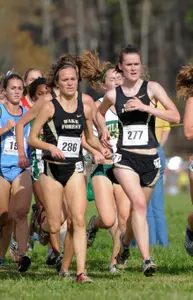 Marley Burns and Merry Placer run at the 2008 NCAA Southeast Regionals.