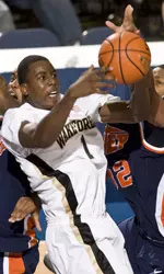 Al-Farouq Aminu battles for a rebound with UTEP's Claude Britten, right