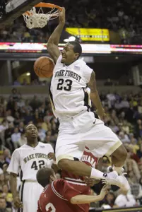 James Johnson dunks on Indiana's Matt Roth. (AP Photo/Chuck Burton)