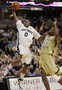 Jeff Teague drives past Georgia Tech's Alade Aminu during the first half.