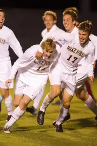 Andy Lubahn and Luke Norman celebrate Norman's goal