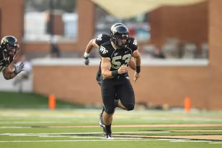 Senior long snapper Greg Bechtel