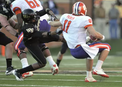 A.J. Marshall sacks Clemson QB Kyle Parker in the second quarter.