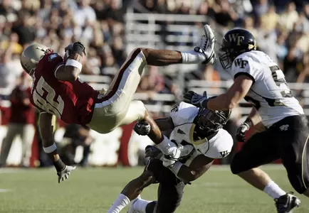 Cyhl Quarles and Hunter Haynes make a stop in last year's game at Boston College.