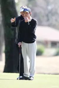 Assistant coach Dan Walters and freshman Evan Beck.