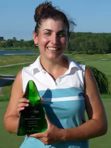 Nannette Hill holds the trophy after claiming her first professional victory.