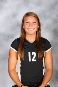 Senior outside hitter Kristen White