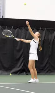 Kayla Duncan serves at ITA Regionals