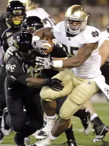 Linebacker Justin Jackson makes a hit on Notre Dame's Jonas Gray during last weekend's game.
