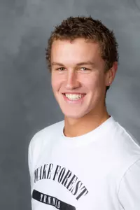 Adam Lee won his first college match to clinch the win for Wake