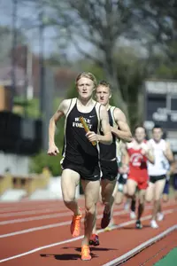 Thomas Morrison (front) and Nate Guthals ran the fourth and second legs, respectively, in the winning 4x800m relay