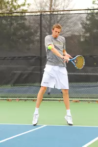 Iain Atkinson teamed with David Hopkins to win their fourth straight doubles match