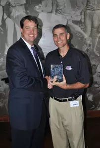 Head baseball coach Tom Walter with his Honorary Coaches Award from the Winston-Salem Dash.