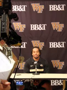 Brandon Pendergrass (22) chats with members of the television media at Wake Forest's weekly football press conference on Tuesday