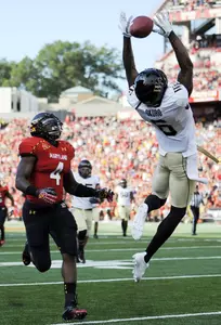 Chibuikem Okoro breaks up a pass in the first half.
