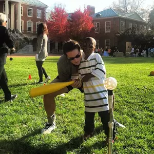 Lindsy Wright helps a child during Project Pumpkin