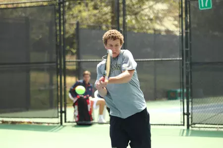 Adam Lee won all four of his singles and doubles matches Saturday