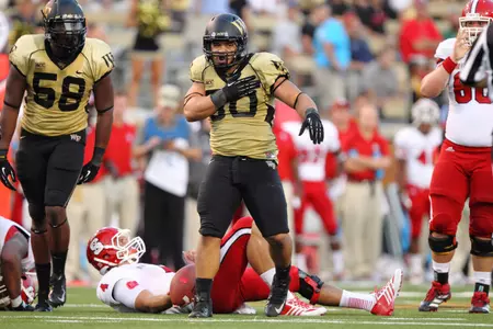 Nose guard Nikita Whitlock was named a mid-season All-American by Phil Steele.