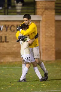 Ricky Greensfelder and Alec Ferrell celebrate after the win
