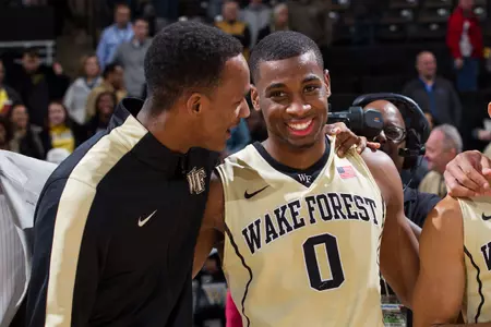 Greg McClinton (left) has been there to encourage his teammates from the sidelines this season.