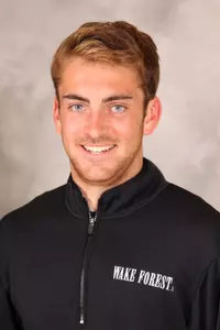 Freshman Charlie Ionata breaks school record in hammer throw.