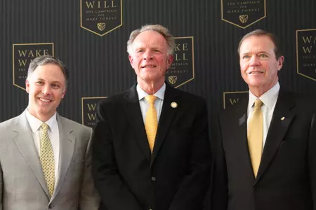L-R: Head football coach Dave Clawson, Bob McCreary ('61), Director of Athletics Ron Wellman