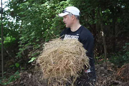 Head football coach Dave Clawson was among the volunteers on Tuesday.